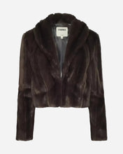 A dark brown cropped fur jacket with a wide collar and long sleeves, shown flat against a light grey background.