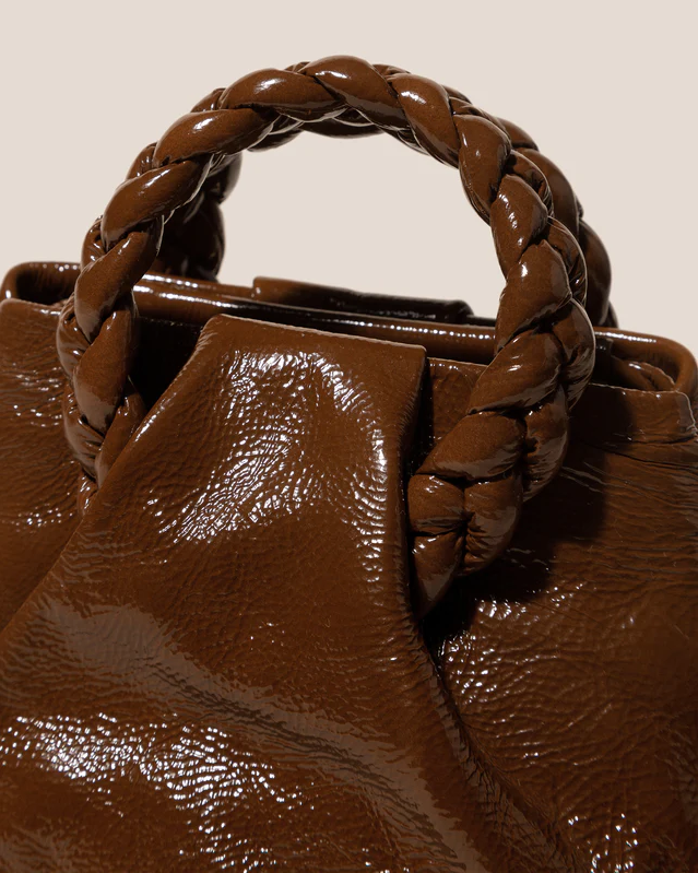 HEREU Bombon glossed leather cross-body bag