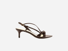 A dark brown patent leather kitten heel sandal with adjustable gold buckle at the ankle and a pointed toe.