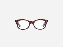 A pair of eyeglasses with a brown tortoise pattern frame and round lenses.