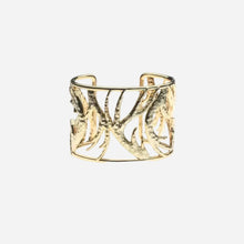 Gold cuff bracelet with tree branch design