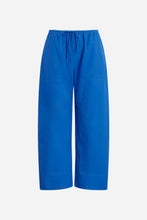 Blue carpenter pants with a drawstring waist on a light grey background.