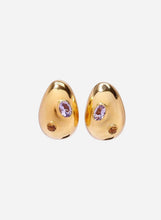 gold earrings with a purple and amber gemstone