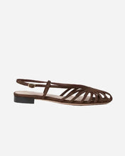 Brown sandal with a thin slingback strapon a light gray background