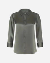 A long-sleeve button-up shirt in an olive green silk fabric, shown against a light gray background.