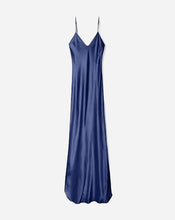 Navy satin slip dress on a light gray background
