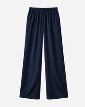 navy blue silk wide-leg pants with an elastic waistband. displayed on a light grey background