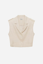 Cropped linen beige vest on a light grey background