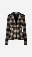 A tailored blazer in a brown, beige, and black plaid pattern, featuring a single button closure, notched lapels, and front patch pockets, shown against a light grey background.