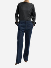 indigo trouser jeans on a light grey background
