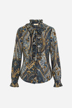 A long-sleeve blouse with a high ruffled collar and front tie, featuring an intricate paisley pattern in navy blue, gold, and beige.