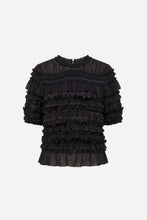 A black ruffled short-sleeve blouse with a sheer mesh high neckline, photographed against a light grey background.